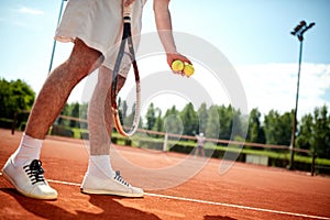 Close up of tennis playerÃ¢â¬â¢s legs serving photo